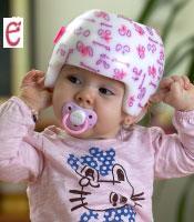 child with a protection helmet on