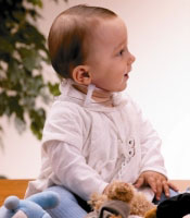 child with EOS collar